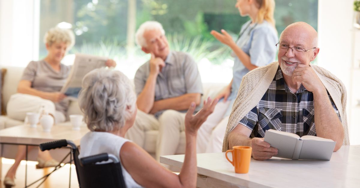 Seniors Talking In Senior Housing